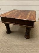 An Indian hardwood square coffee table (H40cm Sq60cm)