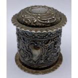 A small silver lidded pot