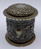 A small silver lidded pot