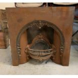 A reclaimed fire place with cameo shell grate by Fire Place Ltd London
