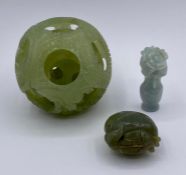 Three Oriental curiosities, one in jade