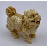 Signed netsuke of a dragon