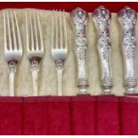 A Selection of six continental silver forks (330g), marked 800 along with six silver handled knives,