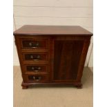A mahogany unit with faux drawers to front (H76cm W80cm D47cm)