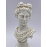 A small Apollo bust sculpture