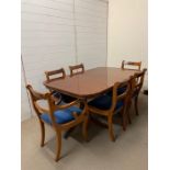 A twin pedestal dining table with string inlay to edge and six chairs, one centre leaf (H76cm W161cm