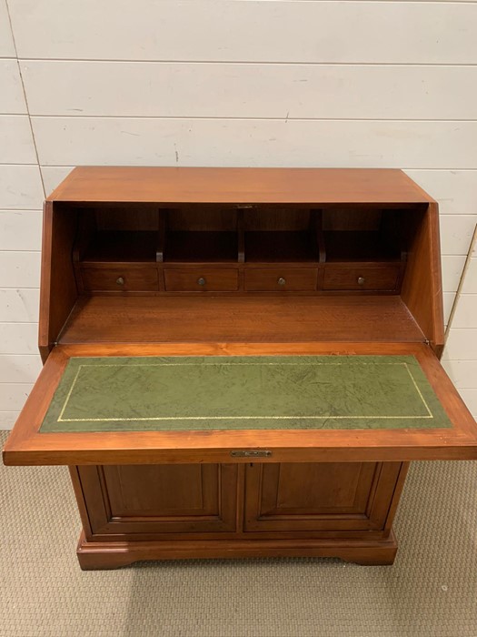 A bureau, fall front opening to reveal pigeon holes and drawers (H101cm W85cm D45cm) - Image 4 of 5