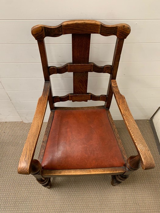 An oak open armchair with oxblood seat cushion - Image 2 of 4