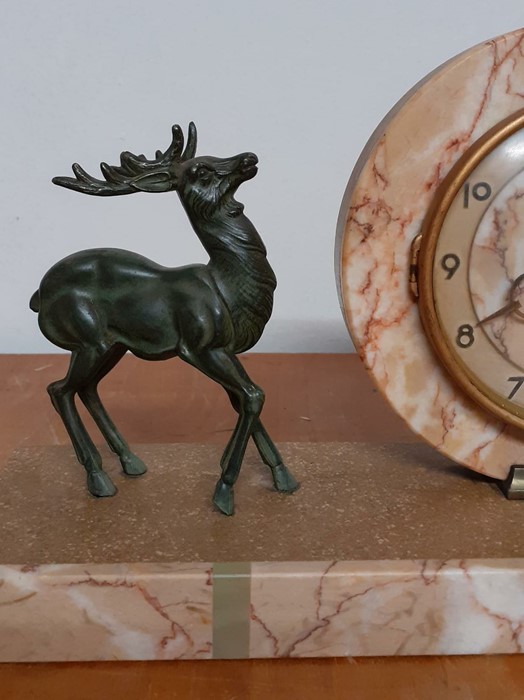 An Art Deco mantel clock, mounted with two deer's, the dial with Arabic numerals, (restauration), ( - Image 2 of 4