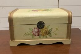 A small painted wooden trunk decorated with flowers (H25cm W45cm D29cm)
