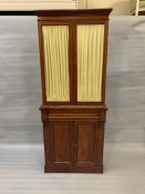 A mahogany glazed curtain bookcase with drawer and cupboard under (H190cm W77cm D34cm)