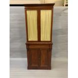 A mahogany glazed curtain bookcase with drawer and cupboard under (H190cm W77cm D34cm)