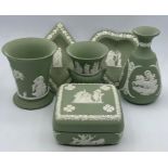 A group of vintage wedgwood ‘sage green’ jasper ware comprising of trinket pots and vases (6)