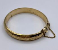 A 9ct gold bracelet (Total weight 13g)