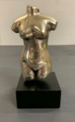 A female short torso sculpture on base signed and numbered (H17cm W7cm)