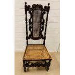 A Charles II style dining chair with caned panel back and caned seat