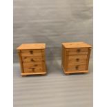 A pair of pine bedsides with three drawers (H55cm W47cm D36cm)