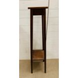 A tall mahogany plant stand (H116cm)