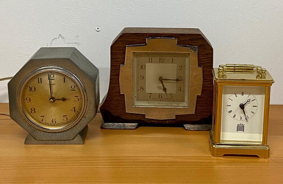 Two 1960's mantle clocks by Smith Sectric and Ferranti and one other