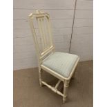 A white painted chair