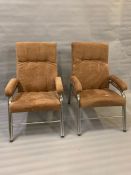 A pair of Mid Century tubular frame lounge chairs in original fabric (H100cm W62cm D60cm)