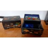 A pair of Chinese black lacquered jewellery boxes, fitted interior with mirror, (10x18x13 cm ). (2)