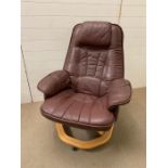 A leather oxblood easy armchair