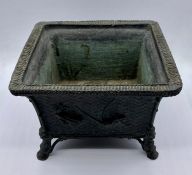 An Interesting bronze planter with fly motif. (18 cm square by 12 cm high)