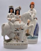 A pair of vintage Staffordshire pottery (style) figures, compromising of "Returning home" and a