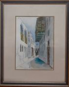 Abdul Wahab Al Kooheji (b.1945) Bahraini, "The narrow street, Manama" (Bahrain), signed, watercolour