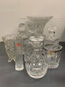 A selection of cut glass to include decanters, vases and lead crystal