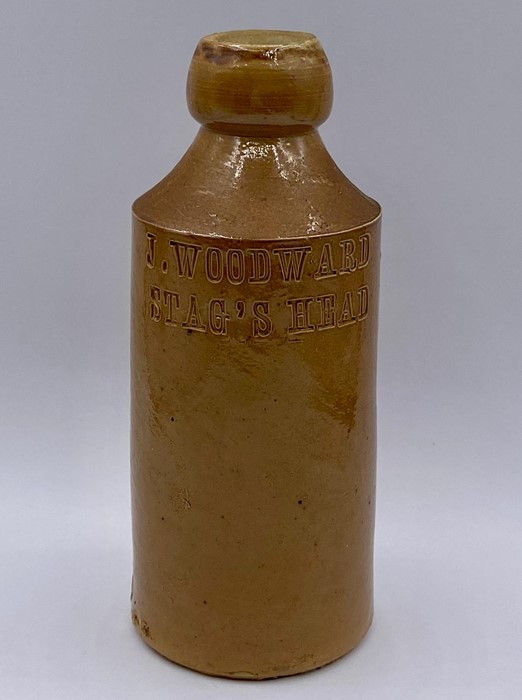 A J Woodward Stag's Head Doulton Lambeth stoneware bottle.