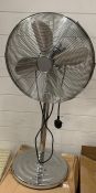 A floor standing chrome fan (H93cm)