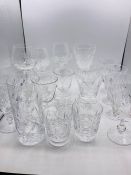 A selection of cut glass glasses various sizes