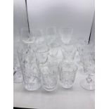 A selection of cut glass glasses various sizes