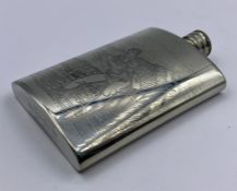 An engraved pewter flask