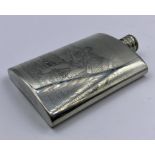 An engraved pewter flask