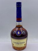 A Boxed Bottle of Courvoisier and two balloon glasses.