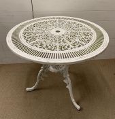 A circular white metal garden table (H70cm Dia80cm)