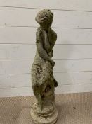 A garden statue of a goddess sitting on a rock (H69cm)