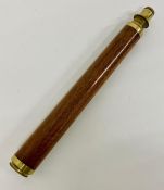 A single drawer wooden and brass telescope