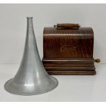 An Edison Gem phonograph in oak case with aluminium horn