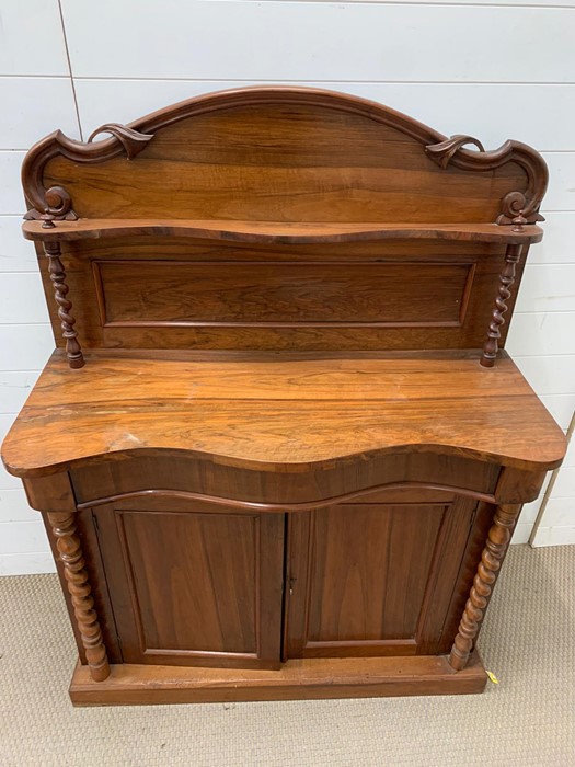 A small sideboard or serving table with barley twist pillars and cupboard to base (H136cm W103cm - Image 2 of 3