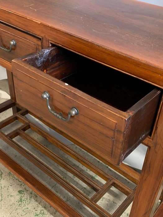 An oriental style hard wood console table with three drawers to centre and shelf (H80cm W100cm - Image 3 of 4