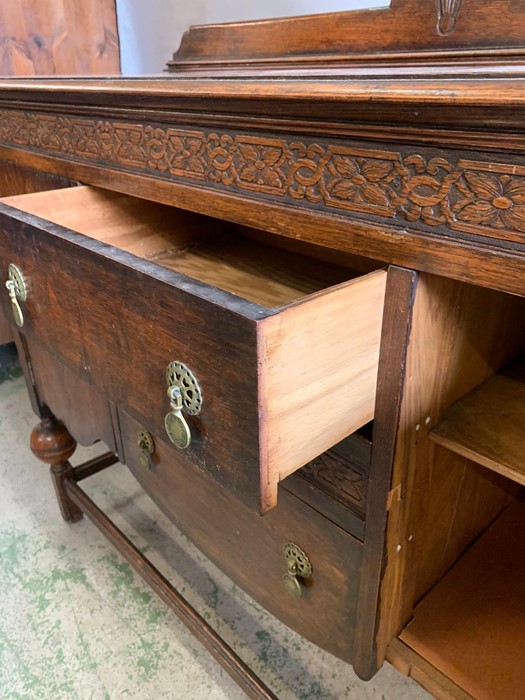 A mahogany sideboard with carved details to doors (H110cm W137cm D48cm) - Image 4 of 4