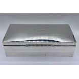 A Substantial silver cigarette box by Hamilton & Co of Calcutta (H7cm W24.5cm D12cm)