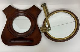 A Mahogany mirror and a circular mirror on a brass arm