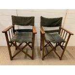 A pair of vintage folding director's chairs with green cord upholstery