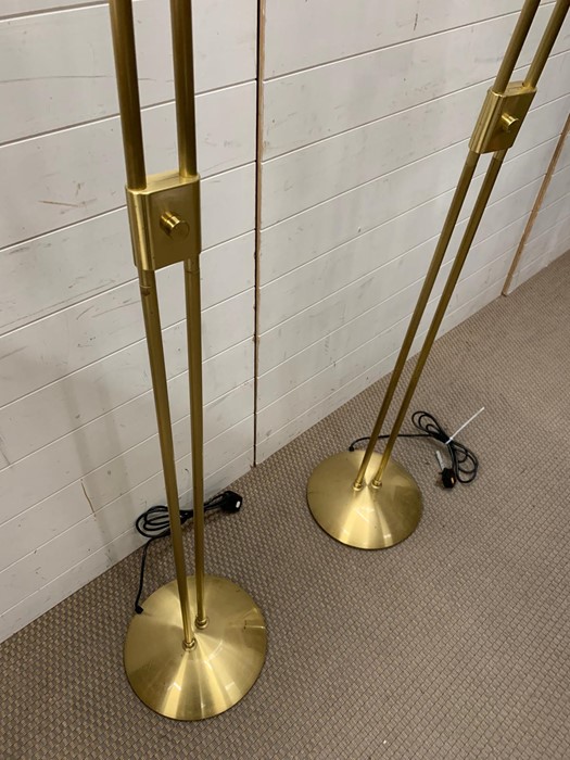A pair of contemporary brass effect floor standing lamps with glass shades - Image 3 of 4
