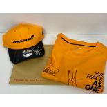 FORMULA ONE: Mclaren F1 memorabilia 2020 Signed caps and t-shirt by Lando Norris and Carlos Sainz